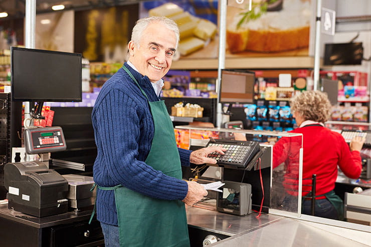Jobs for retirees in Canada: smiling senior retail professional